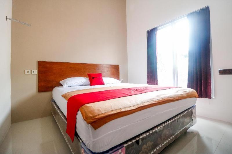 Urbanview Hotel Ava Banjarmasin By Reddoorz Room photo